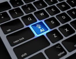 a computer keyboard with a blue light on it